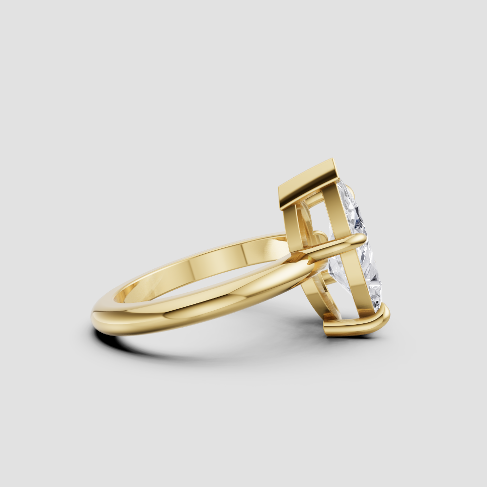 Modern Pear-Cut Diamond Solitaire Engagement Ring – 14k Yellow Gold with V-Prong